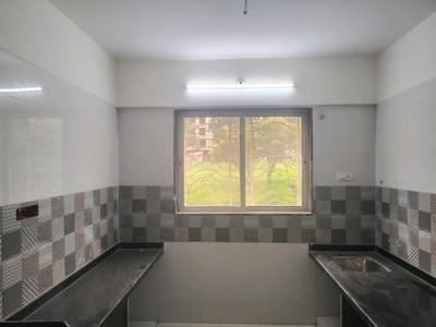 Kitchen Image of 560 Sq.ft 1 BHK Apartment / Flat for rent in Rajaram Sukur Enclave, Kasarvadavali Thane for Rs. 15999
