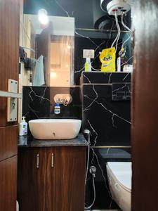 Common Bathroom Image of 500 Sq.ft 1 BHK Apartment / Flat for sale in Mehrauli New Delhi for Rs. 2900000