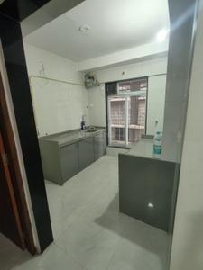 Kitchen Image of 550 Sq.ft 1 BHK Apartment / Flat for rent in Bindra One, Andheri East Mumbai for Rs. 45000