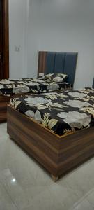Bedroom Image of Shristhi PG in Sector 63, Noida