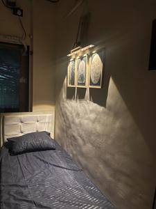 Bedroom Image of Blue Orchid’s Nest – Premium Girls PG in Nerul, Navi Mumbai