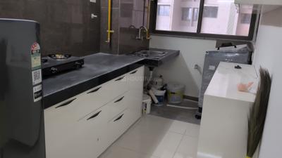 Kitchen Image of 717 Sq.ft 1 BHK Apartment / Flat for rent in Zaveri Palash Homes, Sarkhej Ahmedabad for Rs. 25000