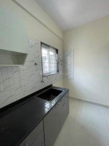 Kitchen Image of 650 Sq.ft 1 BHK Builder Floor for rent in Singasandra Bengaluru for Rs. 25000