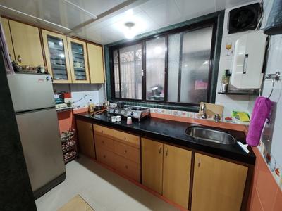 Kitchen Image of 550 Sq.ft 1 BHK Apartment / Flat for rent in Kopar Khairane Navi Mumbai for Rs. 28000