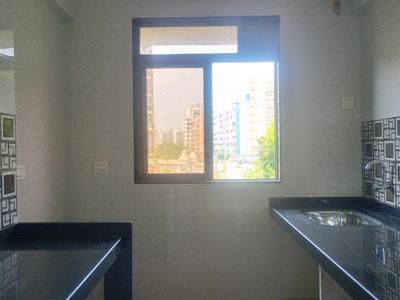 Kitchen Image of 728 Sq.ft 1 BHK Apartment / Flat for sale in Paradise Sai World Dreams, Dombivli East Thane for Rs. 5150000