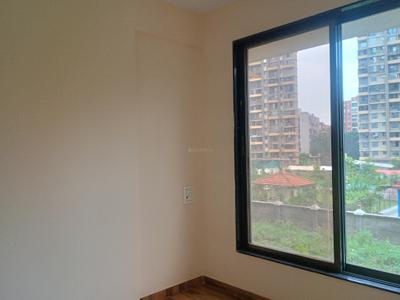 Bedroom Image of 794 Sq.ft 1 BHK Apartment / Flat for sale in Rustomjee Urban Woods Palm, Dombivli East Thane for Rs. 5450000
