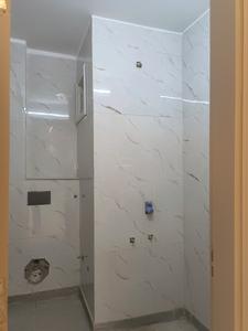 Common Bathroom Image of 1035 Sq.ft 3 BHK Apartment / Flat for sale in Sector 24 Rohini New Delhi for Rs. 8500000