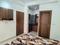 Bedroom Image of Royal Inn Pg in Sector 128, Noida