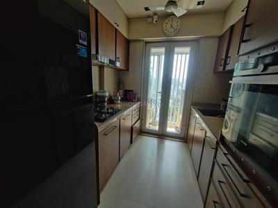 Kitchen Image of 910 Sq.ft 2 BHK Apartment / Flat for sale in Paradigm Nivan, Khar West Mumbai for Rs. 52500000