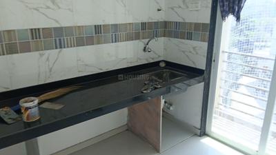 Kitchen Image of 703 Sq.ft 2 BHK Apartment / Flat for sale in Om Paraiso Phase II, Padle Gaon Thane for Rs. 7000000