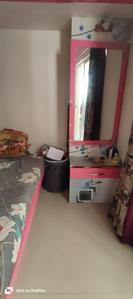 Bedroom Image of 680 Sq.ft 1 BHK Apartment / Flat for rent in Spine Road Pune for Rs. 18500