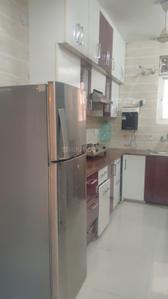 Kitchen Image of 950 Sq.ft 2 BHK Apartment / Flat for rent in CGHS Rail Vihar, Sector 15 Gurgaon for Rs. 42000