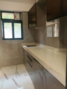 Kitchen Image of 700 Sq.ft 1 BHK Apartment / Flat for sale in Varadvinayak Siddhivinayak Aura Building 1, Mira Road East Mira Bhayandar for Rs. 7200000