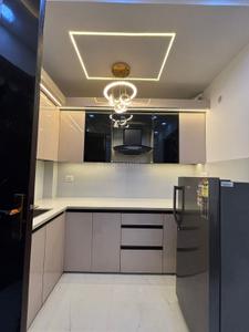Kitchen Image of 500 Sq.ft 2 BHK Builder Floor for rent in Dwarka Mor New Delhi for Rs. 21000