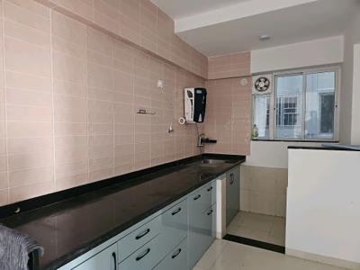 Kitchen Image of 1050 Sq.ft 2 BHK Apartment / Flat for sale in NG Rathi Palmnest G Tower Ultima, Wagholi Pune for Rs. 7700000