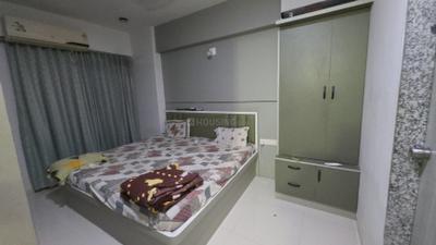 Bedroom Image of 1197 Sq.ft 2 BHK Apartment / Flat for sale in Sarjan Setu Altezza, Tragad Ahmedabad for Rs. 6900000