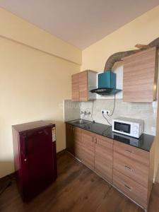 Kitchen Image of 400 Sq.ft 1 RK Apartment / Flat for rent in Swaraj Homes Peach Jasmine Apartments, Sector 31 Gurgaon for Rs. 26000