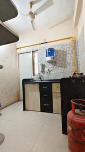 Kitchen Image of 910 Sq.ft 1 BHK Apartment / Flat for rent in Makarba Ahmedabad for Rs. 22000