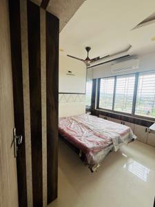 Bedroom Image of 950 Sq.ft 2 BHK Apartment / Flat for sale in Vishesh Balaji Symphony, Shilottar Raichur Navi Mumbai for Rs. 8500000