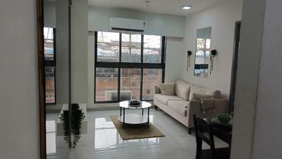 Living Room Image of 610 Sq.ft 2 BHK Apartment / Flat for sale in UK lona, Andheri East Mumbai for Rs. 13500000