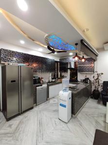 Kitchen Image of 910 Sq.ft 3 BHK Apartment / Flat for sale in Janakpuri New Delhi for Rs. 13000000