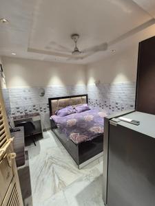 Bedroom Image of 450 Sq.ft 1 RK Builder Floor for rent in Ramesh Nagar New Delhi for Rs. 17000