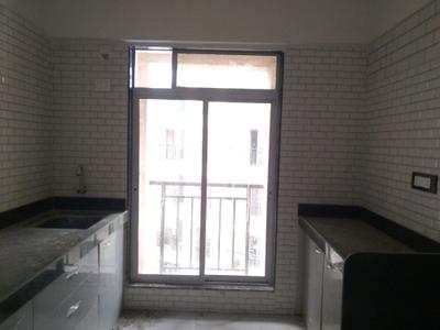 Kitchen Image of 640 Sq.ft 1 BHK Apartment / Flat for sale in Munish Emonics Tower, Vasai East Vasai for Rs. 3767000