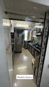 Kitchen Image of 830 Sq.ft 2 BHK Apartment / Flat for sale in Thakurli Thane for Rs. 7499999