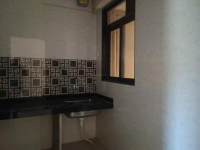 Kitchen Image of 950 Sq.ft 2 BHK Apartment / Flat for sale in Paradigm Ananda Residency, Borivali West Mumbai for Rs. 18500000