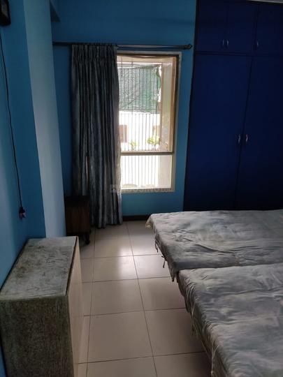 Poojan Apartment Bedroom 1