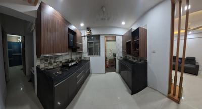 Kitchen Image of 1000 Sq.ft 2 BHK Apartment / Flat for rent in Tulip Infinity Tower B Wing, Ravet Pune for Rs. 31000