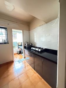 Kitchen Image of 1050 Sq.ft 2 BHK Apartment / Flat for sale in Kothrud Pune for Rs. 12800000