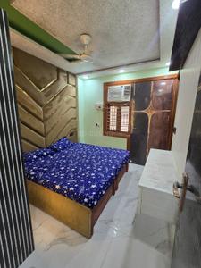 Bedroom Image of 540 Sq.ft 2 BHK Builder Floor for rent in Nawada New Delhi for Rs. 16500
