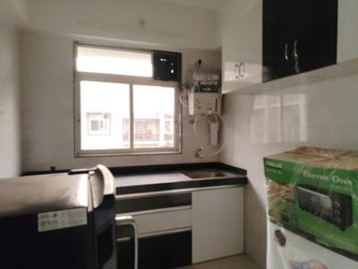 Kitchen Image of 566 Sq.ft 1 BHK Apartment / Flat for rent in Thakur Galaxy, Boisar Mumbai for Rs. 8500