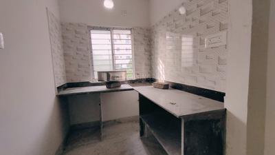 Kitchen Image of 800 Sq.ft 2 BHK Apartment / Flat for sale in Airport Gate No 2 Kolkata for Rs. 2800000