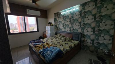 Bedroom Image of 960 Sq.ft 2 BHK Apartment / Flat for sale in Maruti Diamond Sky, Adalaj Gandhinagar for Rs. 6900000