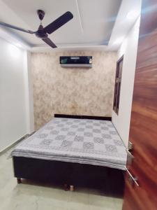 Bedroom Image of 650 Sq.ft 2 BHK Builder Floor for rent in Sector 5 Rohini New Delhi for Rs. 25000