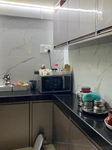 Kitchen Image of 1100 Sq.ft 2.5 BHK Duplex for rent in Shivshankar Plaza, Airoli Navi Mumbai for Rs. 62000