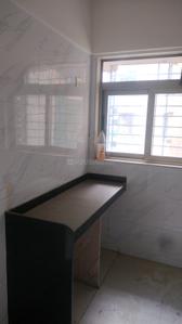 Kitchen Image of 1050 Sq.ft 2 BHK Apartment / Flat for sale in Vishesh Balaji Symphony, Shilottar Raichur Navi Mumbai for Rs. 7800000