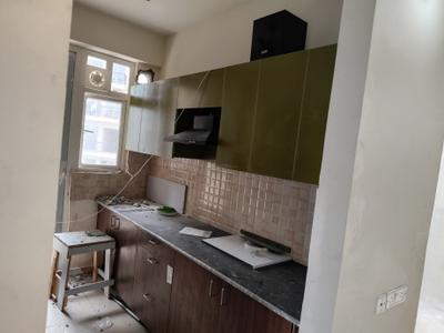 Kitchen Image of 1345 Sq.ft 3 BHK Apartment / Flat for rent in Phase 2 Noida for Rs. 36000