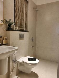 Common Bathroom Image of 900 Sq.ft 2 BHK Apartment / Flat for sale in Rustomjee La Familia, Thane West Thane for Rs. 15000000