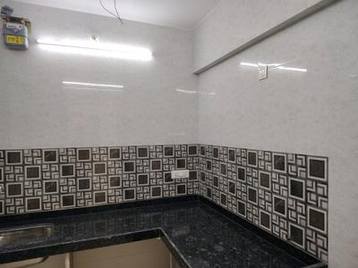 Kitchen Image of 936 Sq.ft 1 BHK Apartment / Flat for rent in Haware Dahlia Bldg A D And E, Kasarvadavali Thane for Rs. 14000