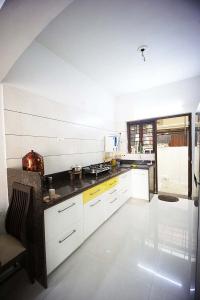 Kitchen Image of 2052 Sq.ft 3 BHK Independent House for sale in Bhadaj Ahmedabad for Rs. 29000000