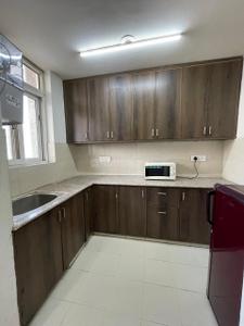 Kitchen Image of 1300 Sq.ft 2 BHK Builder Floor for rent in Sector 31 Gurgaon for Rs. 56000