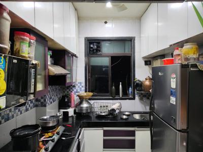 Kitchen Image of 550 Sq.ft 1 BHK Apartment / Flat for rent in Puraniks Kanchan Pushp Society, Kasarvadavali Thane for Rs. 17999