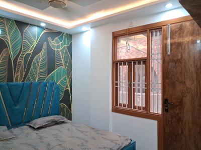 Bedroom Image of 600 Sq.ft 2 BHK Builder Floor for rent in Dwarka Mor New Delhi for Rs. 25000
