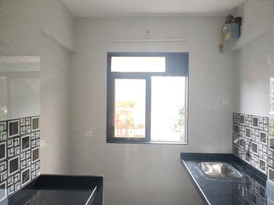 Kitchen Image of 740 Sq.ft 1 BHK Apartment / Flat for rent in Unnati Woods Phase 7, Kasarvadavali Thane for Rs. 16002