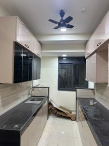 Kitchen Image of 900 Sq.ft 2 BHK Apartment / Flat for rent in Dynamix Divum, Malad East Mumbai for Rs. 75000