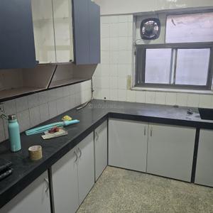 Kitchen Image of 950 Sq.ft 2 BHK Apartment / Flat for rent in Gokul Plaza, Kandivali East Mumbai for Rs. 45000
