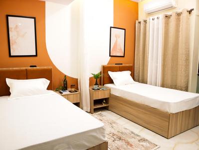 Bedroom Image of Urban Nest Living Orchid in Sector 19, Noida